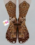 madhubani-figure-womans-dholshehnai-sangeet-checks-peacock-bridal-mehndi design