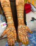 madhubani-mahal-and-chhatri-checks-flowers-peacock-anniversary-mehendi design