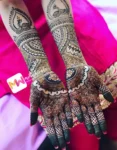 rajasthani-peacock-flowers-checks-leaves-bridal-mehendi design